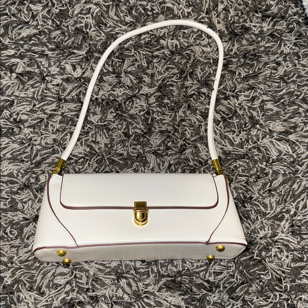 White Shoulder Bag with Gold Accents